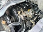 Engine compartment of a used Japanese truck